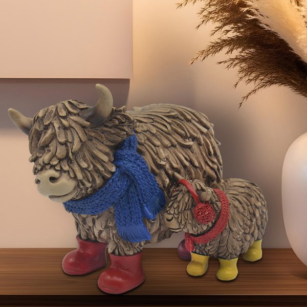 HUGHIE TWIN HIGHLAND COWS